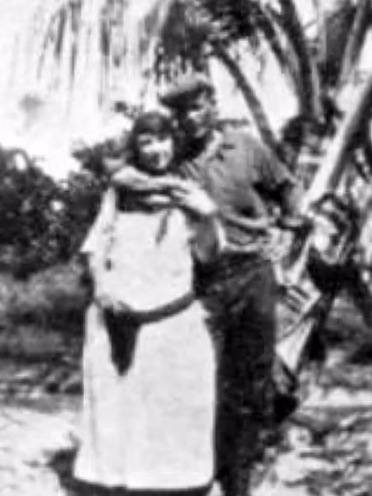 Laura Upthegrove with her .38-caliber revolver and John Ashley in 1921.