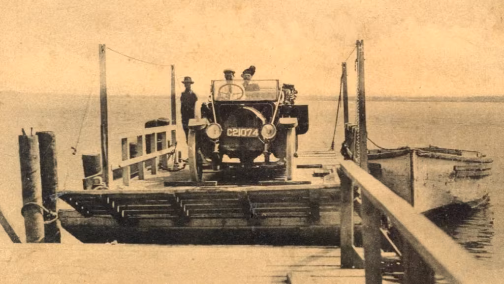 Ferry coming into dock, 1910s .