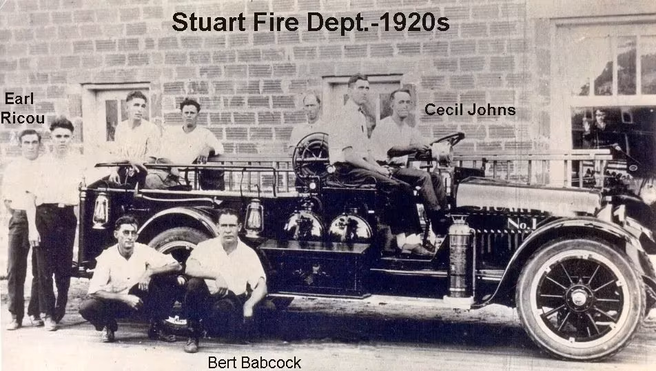 The fire truck built by Babcock and the firemen on board in the 1920s.
