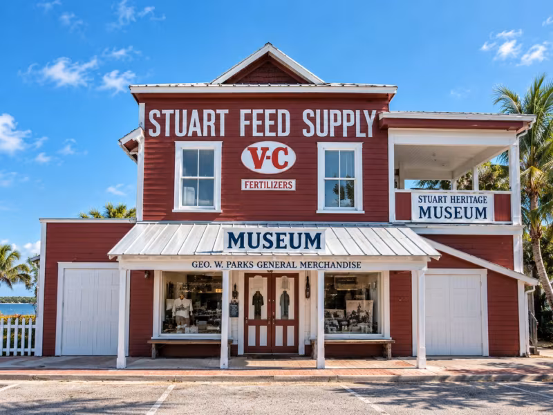 The restored red building today, with Stuart Feed Supply and Museum signs over the front porch